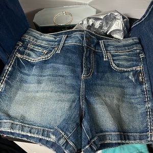 Brand new silver shorts without tags